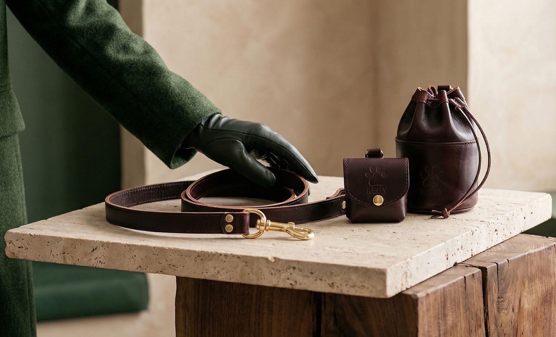 Kelly Dogwear dark leather accessories on stone surface