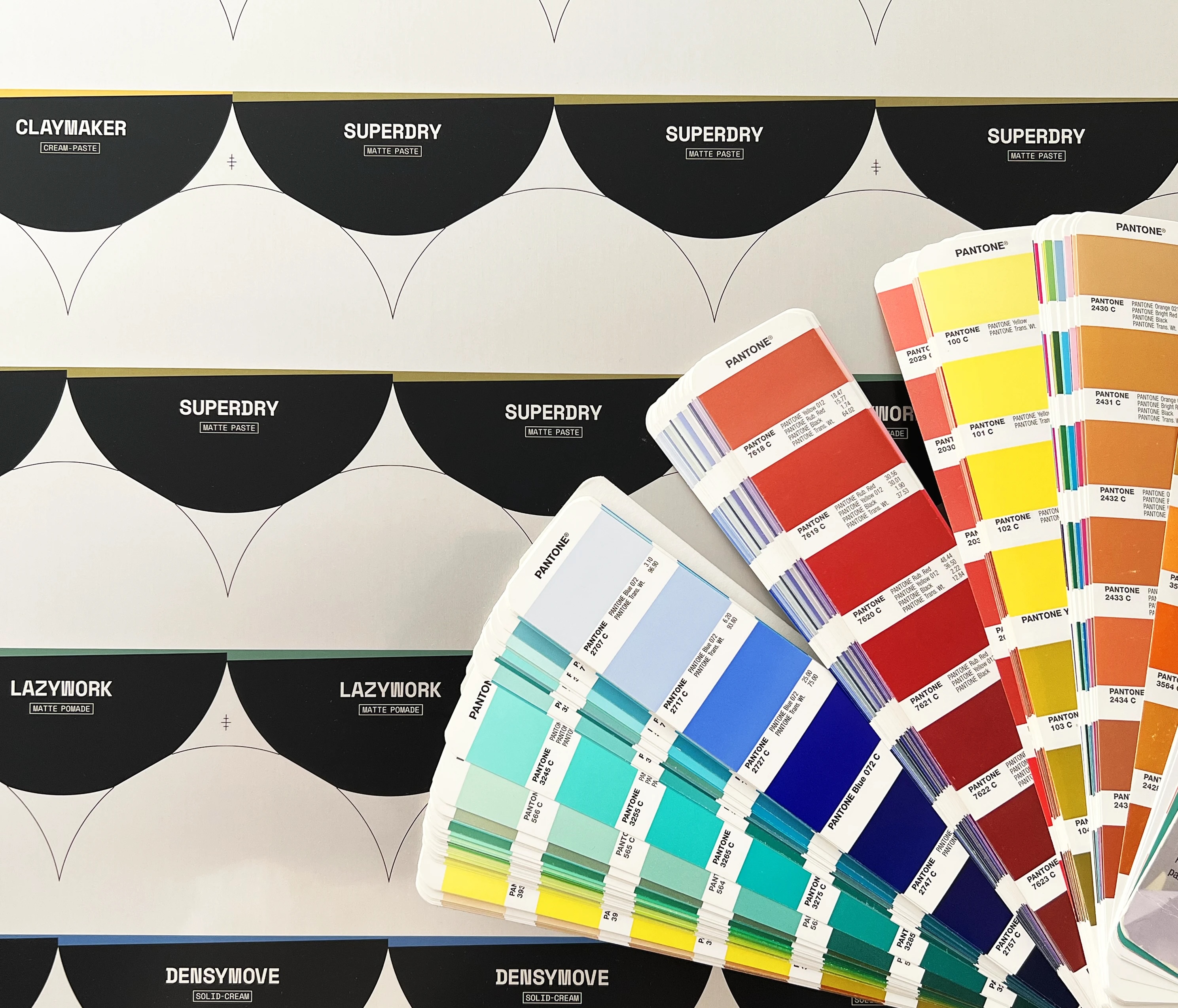 Printed label proofs and Pantone swatch books for the Mezzalama product lines