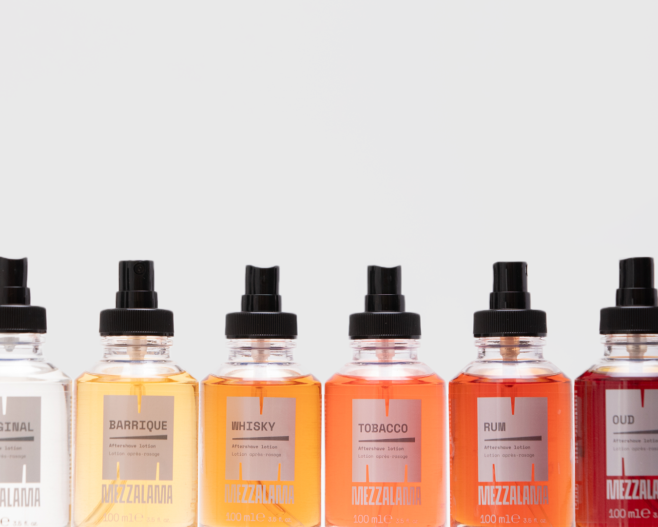 Row of Mezzalama aftershave lotions in a color gradient by scent